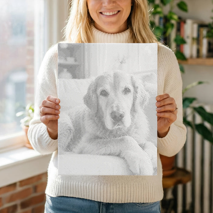 A custom dot painting of a pet, displayed at home