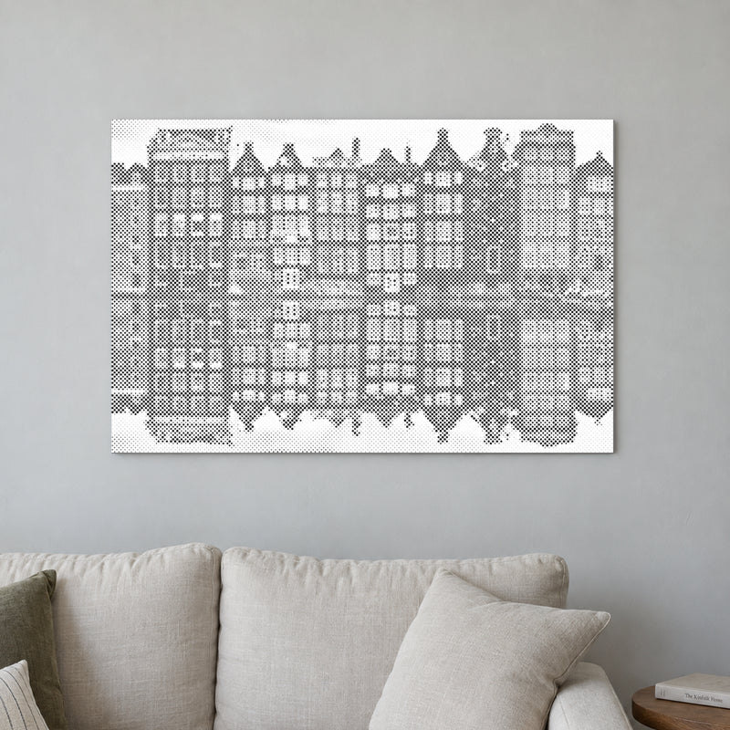 Dot-painting canvas “Amsterdam Houses”, displayed on a light wall in a softly lit room.