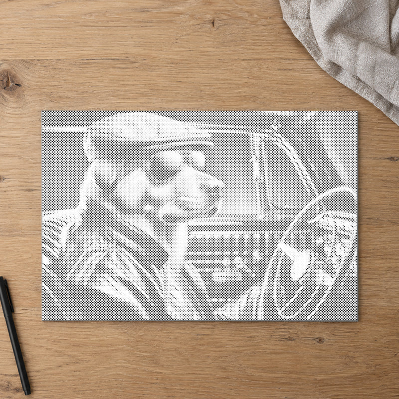 Dot-painting canvas “Cool Dog”, seen from above on a worktable in soft daylight.