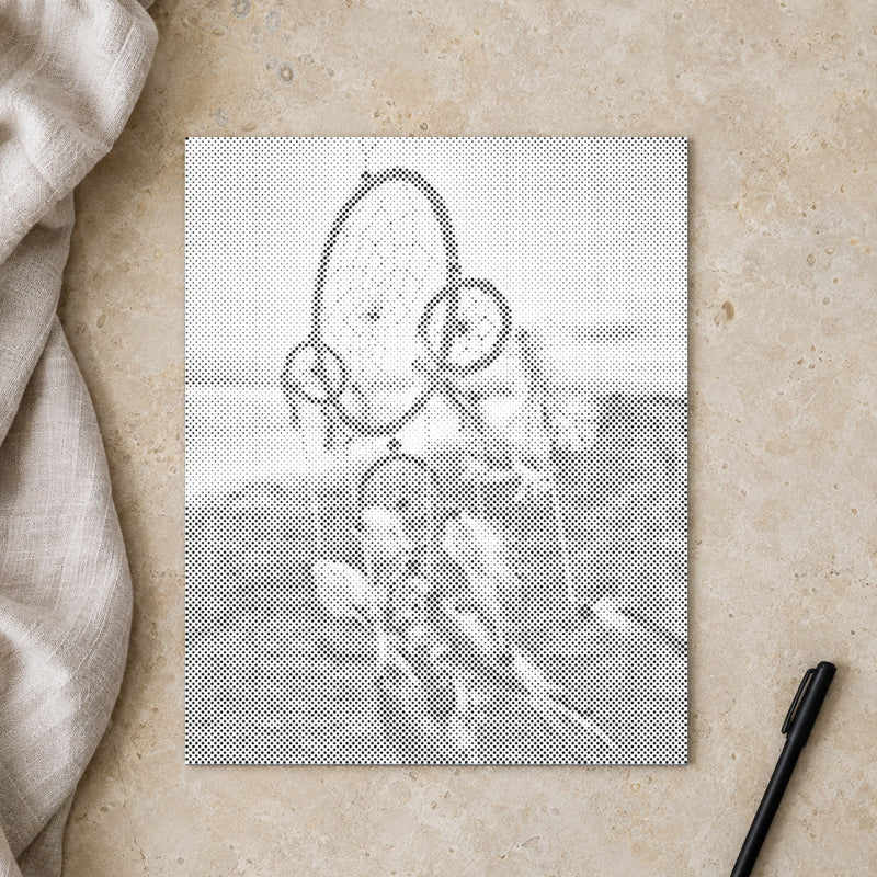 Dot-painting canvas “Dreamcatcher in the Wind”, seen from above on a worktable in soft daylight.