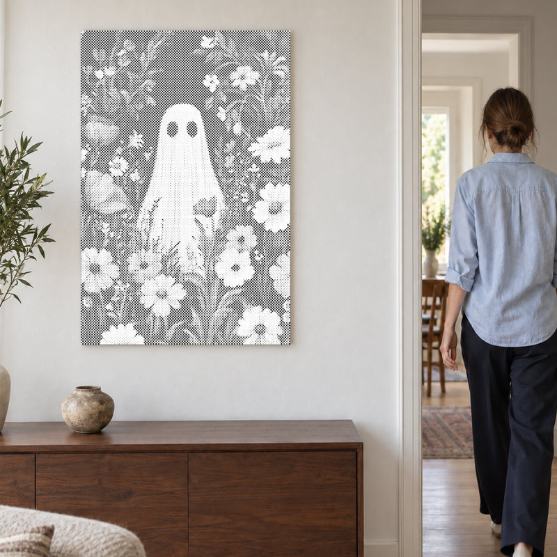 Dot-painting canvas “Ghost in the Flower Field”, on a light wall with a person walking through the doorway nearby.