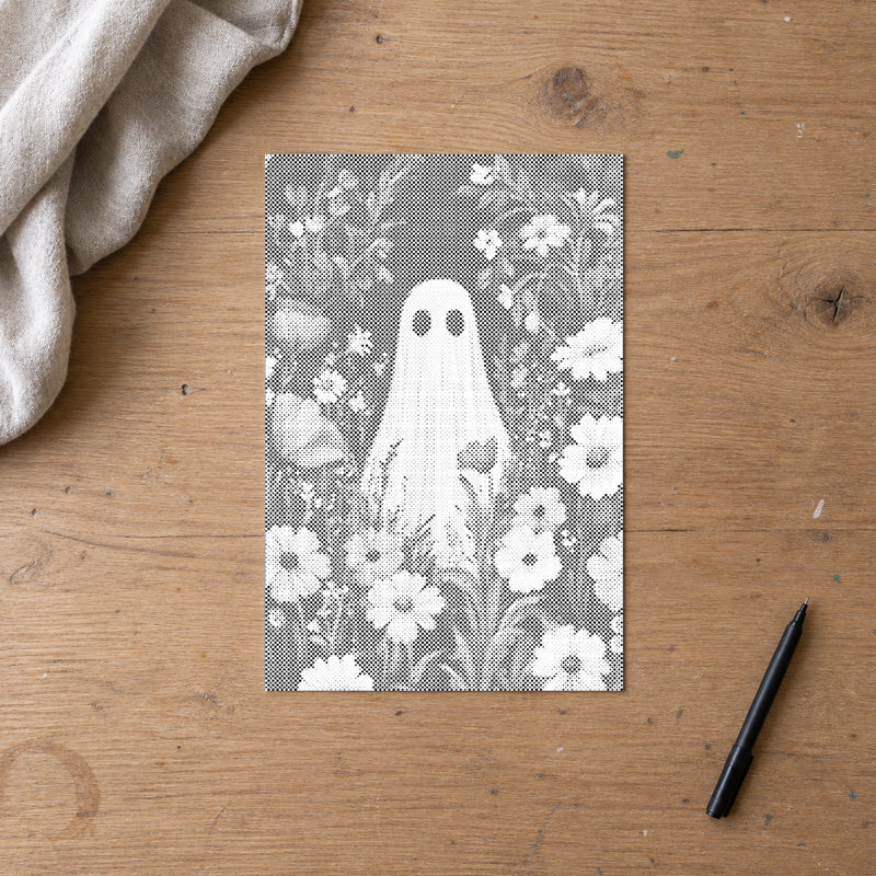 Dot-painting canvas “Ghost in the Flower Field”, seen from above on a worktable in soft daylight.