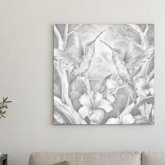Dot-painting canvas “Hummingbirds Among Flowers”, displayed on a light wall in a softly lit room.