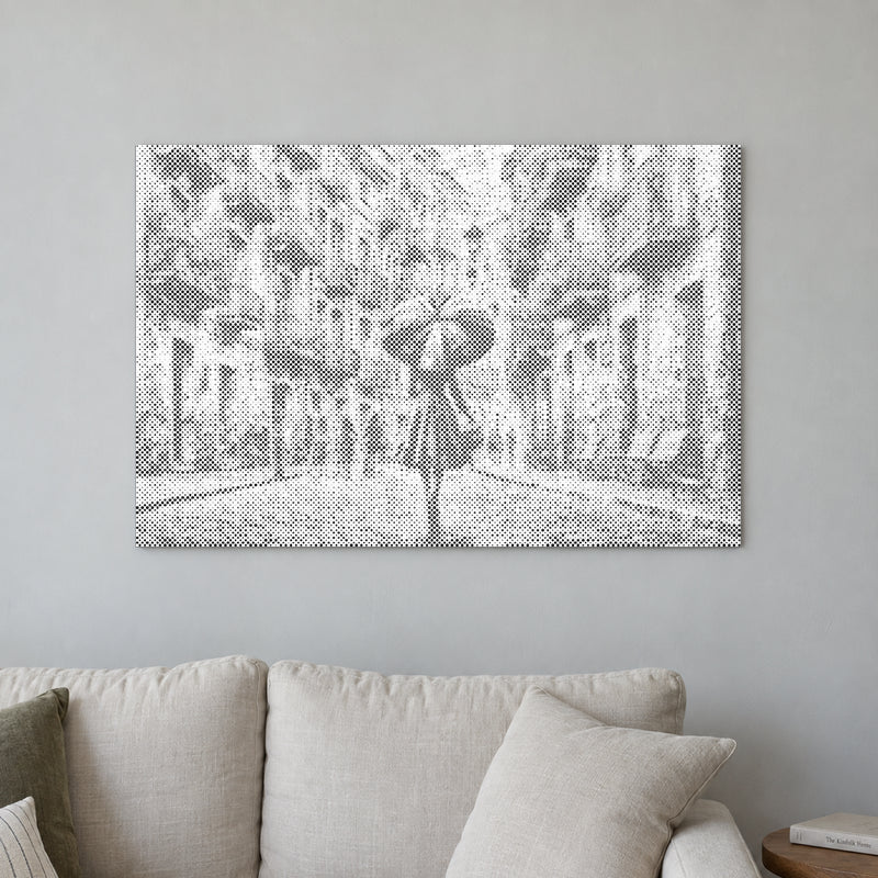 Dot-painting canvas “In the Rain”, displayed on a light wall in a softly lit room.