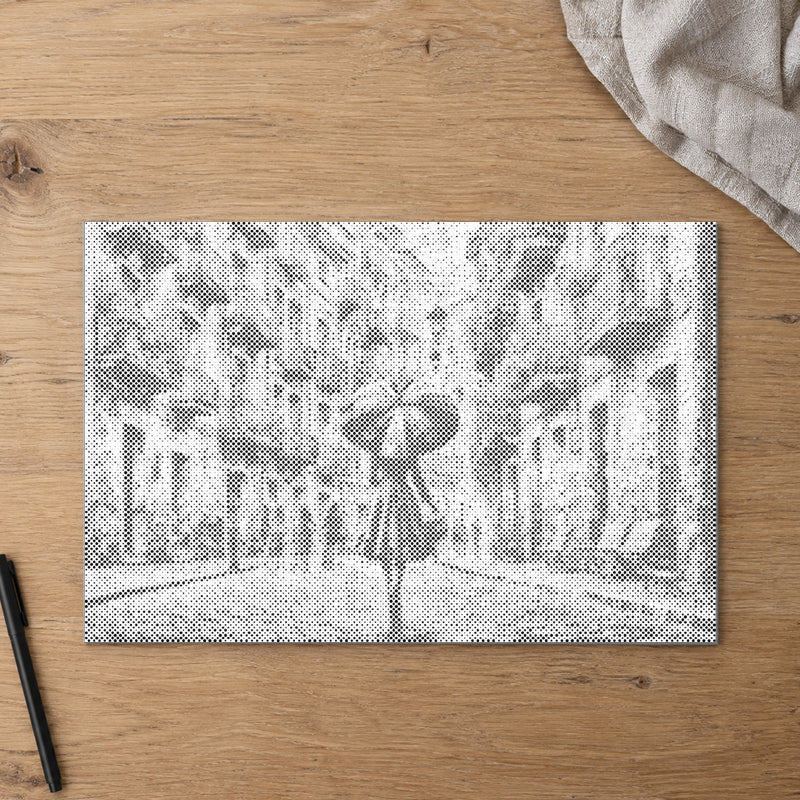 Dot-painting canvas “In the Rain”, seen from above on a worktable in soft daylight.