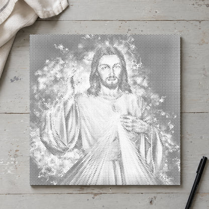 Dot-painting canvas “Jesus: The Sequel”, seen from above on a worktable in soft daylight.