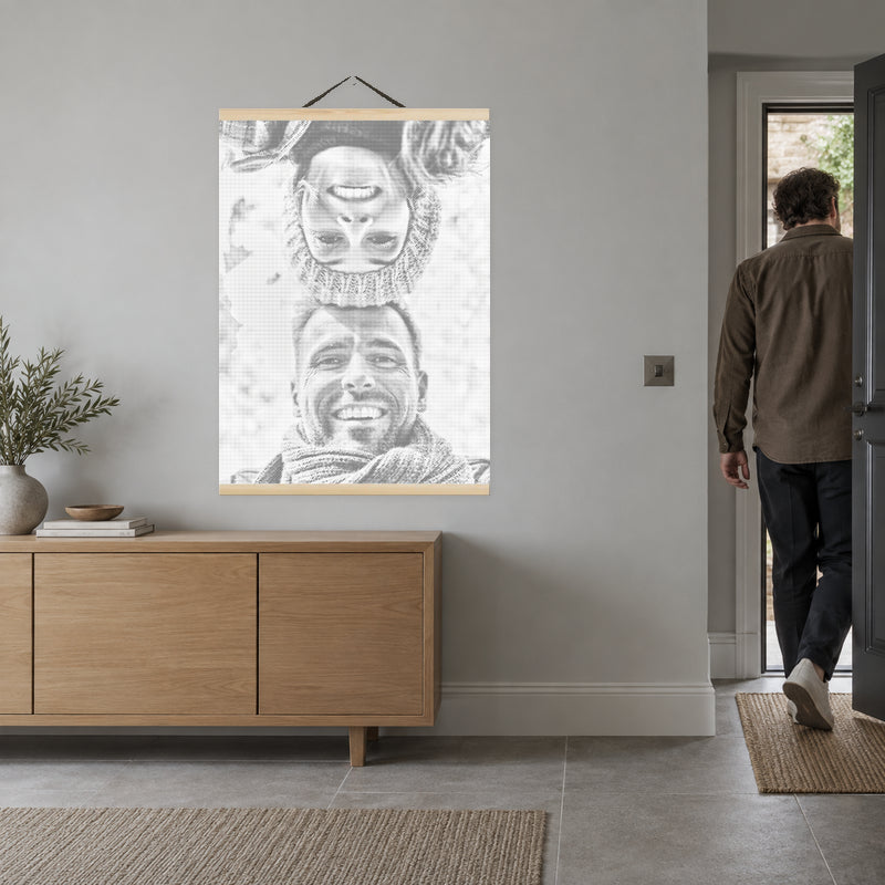 Magnetic Frame for Dot Painting, on a light grey hallway wall with a person in the doorway.