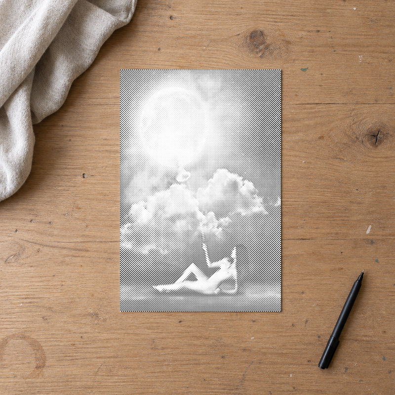 Dot-painting canvas “Monarch of the Moon”, seen from above on a worktable in soft daylight.