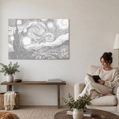 Dot-painting canvas “The Starry Night by Van Gogh”, on a living-room wall with a person reading in an armchair nearby.